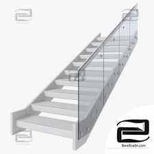 Modern staircase with glass railing