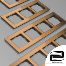 Glass frames for sockets and switches Werkel Favorit (bronze)
