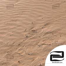 The material is a sandy beach