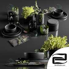 Table setting in black colors set of dishes, tableware