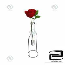 Vase-bottle with a rose