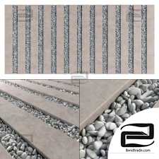 Paving stones from long slabs with pebbles