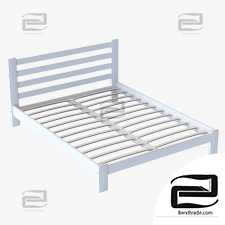 A simple bed with base slats.