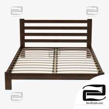 A simple bed with base slats.