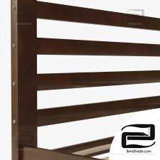 A simple bed with base slats.