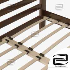 A simple bed with base slats.