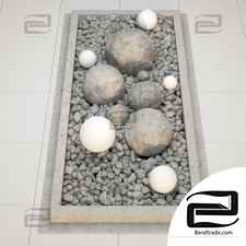 Flowerbed large white pebbles
